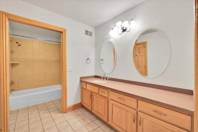 16001 Burr Oak Dr, Huntley, IL 60142 - full bath with tile patterned floors, vanity, and bathing tub / shower combination