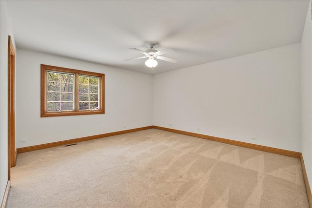 16001 Burr Oak Dr, Huntley, IL 60142 - unfurnished room with light carpet, ceiling fan, and baseboards