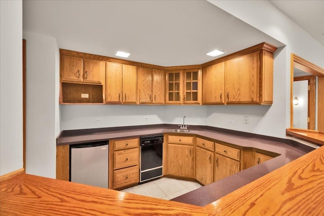 16001 Burr Oak Dr, Huntley, IL 60142 - kitchen featuring freestanding refrigerator, dishwasher, a sink, light tile patterned floors, and dark countertops