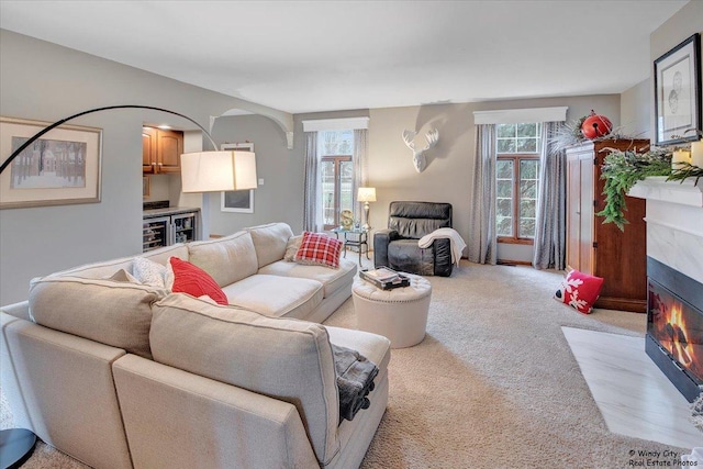 living room with light colored carpet