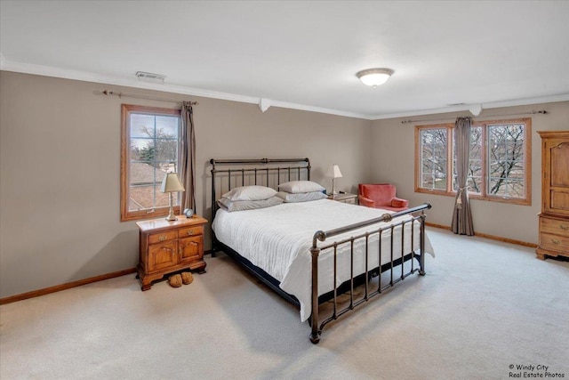 carpeted bedroom featuring ornamental molding