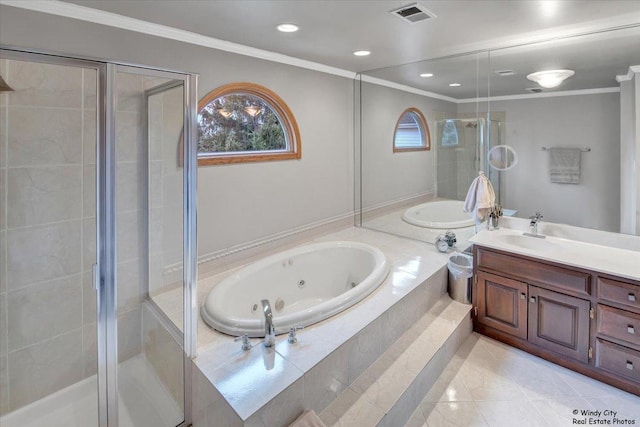 bathroom featuring tile patterned floors, vanity, separate shower and tub, and crown molding