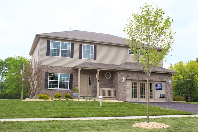 view of front of house featuring a front lawn