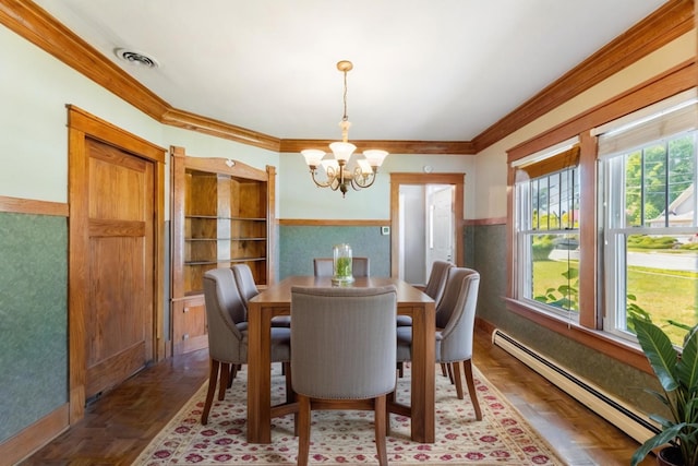 dining room featuring an inviting chandelier, parquet flooring, ornamental molding, and a baseboard heating unit