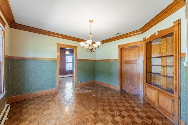 unfurnished dining area featuring dark parquet flooring, an inviting chandelier, baseboard heating, and ornamental molding