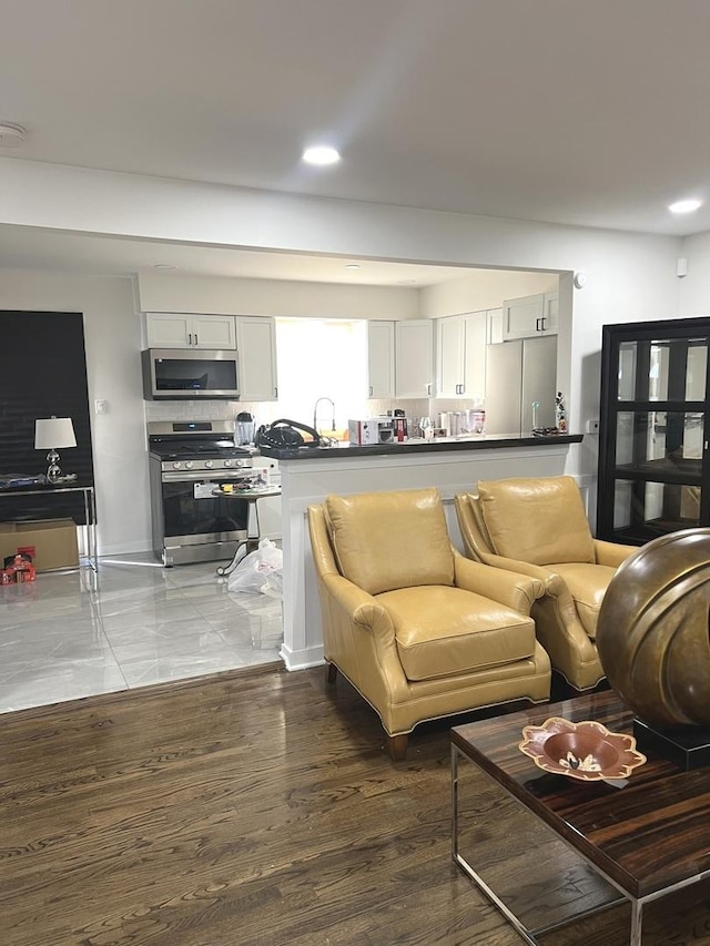 living room with hardwood / wood-style flooring