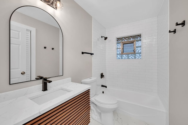 full bathroom with toilet, vanity, and tiled shower / bath combo