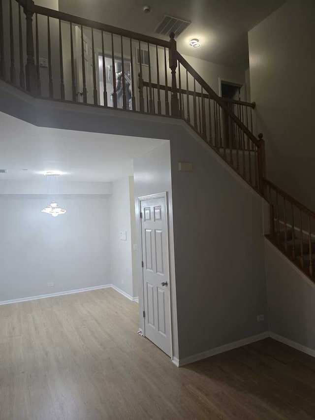 staircase featuring hardwood / wood-style floors