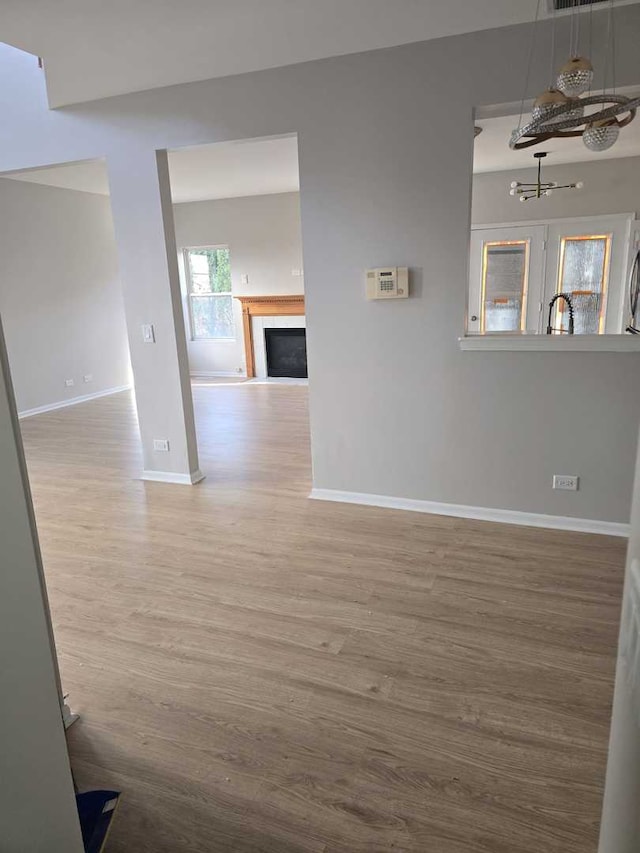 spare room with hardwood / wood-style flooring