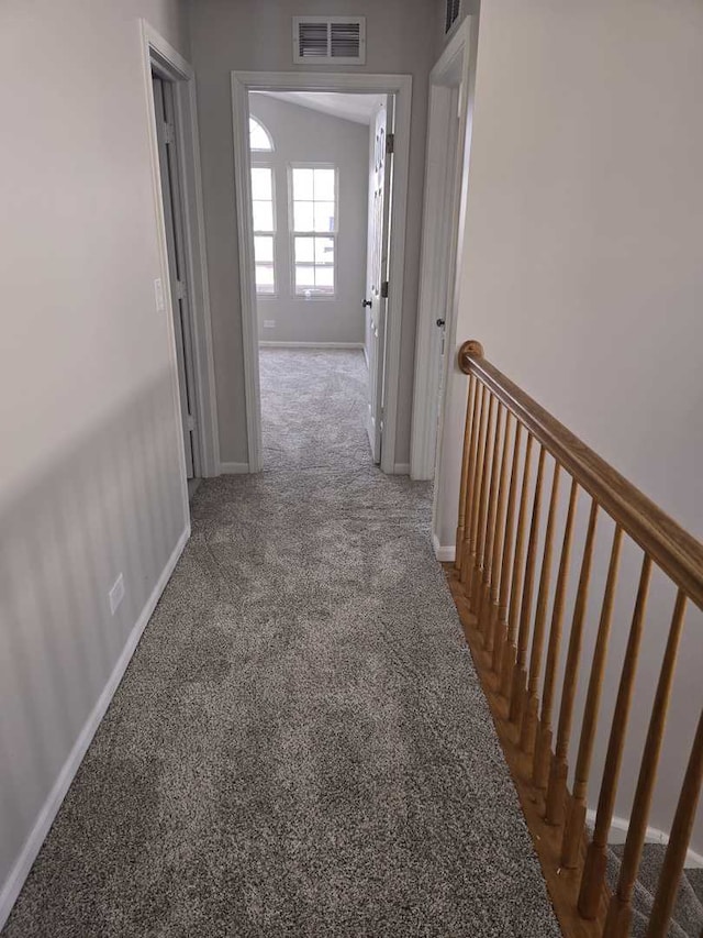 corridor with carpet floors