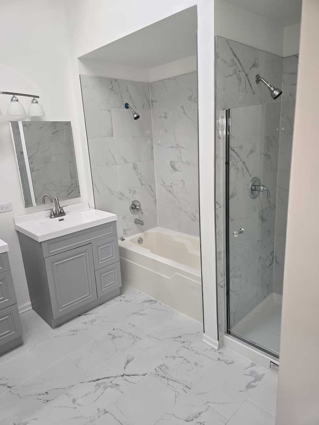 bathroom with separate shower and tub and vanity