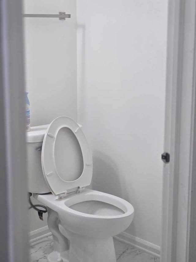 bathroom featuring toilet