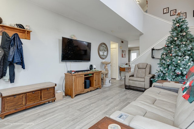 living room with light hardwood / wood-style floors