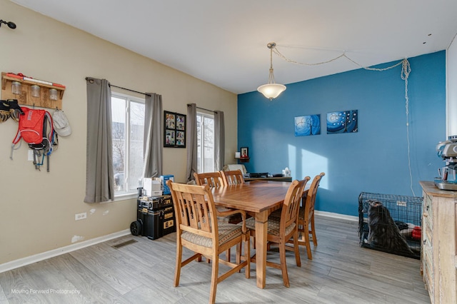 dining area featuring light hardwood / wood-style floors