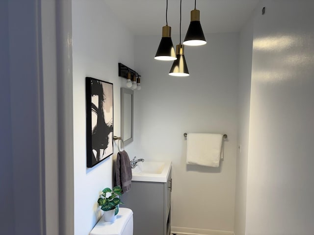 bathroom with vanity and toilet