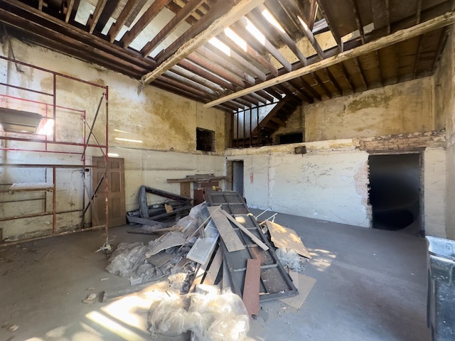 misc room with concrete flooring