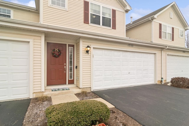 property entrance featuring a garage