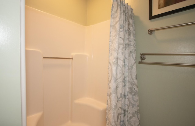 bathroom featuring a shower with curtain