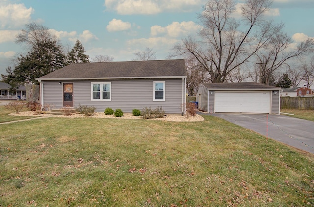 ranch-style home with an outbuilding, a garage, and a front lawn