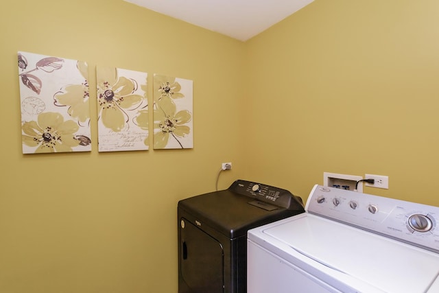 laundry room featuring independent washer and dryer