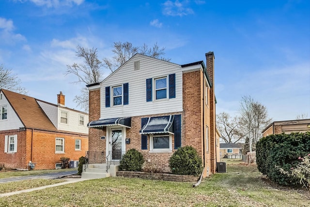 front facade with a front lawn and central AC unit