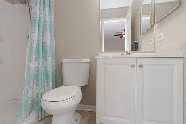 bathroom with vanity, tile patterned floors, ceiling fan, and toilet