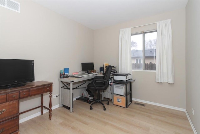 office area featuring light hardwood / wood-style floors