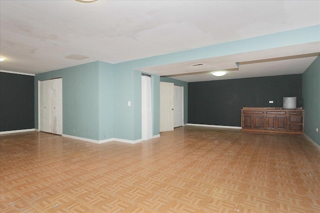 spare room with light parquet floors