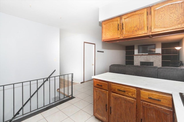 kitchen with light tile patterned flooring