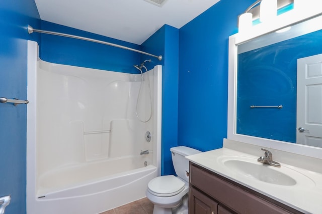 full bathroom with tile patterned floors, vanity, shower / bathing tub combination, and toilet