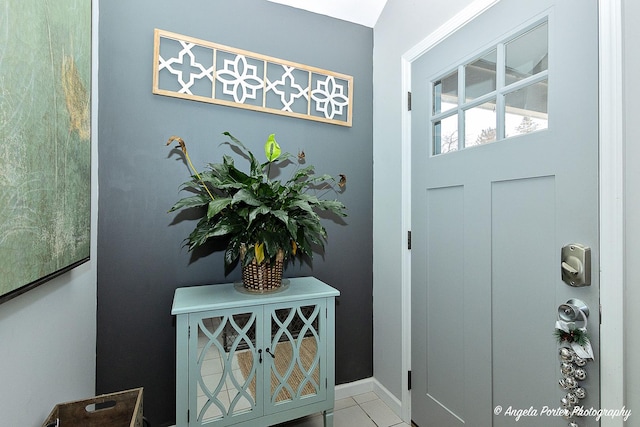 entryway featuring light tile patterned floors