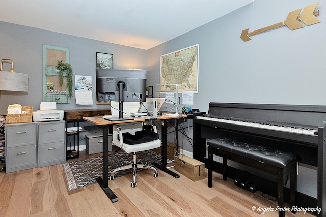 office space with light hardwood / wood-style floors