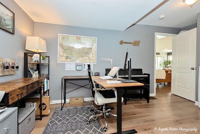 office space featuring light hardwood / wood-style floors