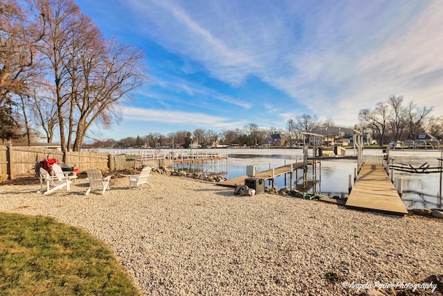 dock area with a water view