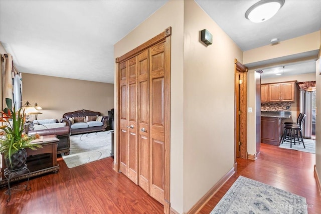 hall featuring dark wood-type flooring