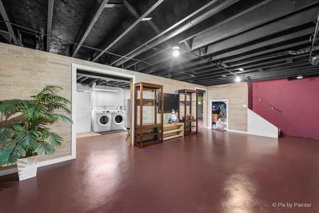 basement featuring washer and clothes dryer