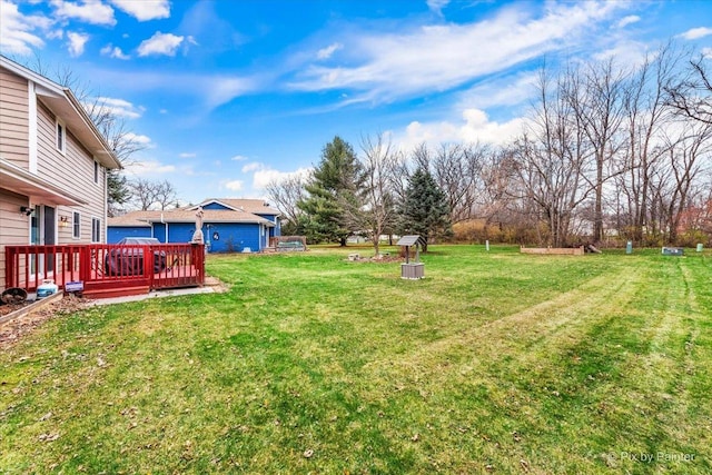 view of yard featuring a deck