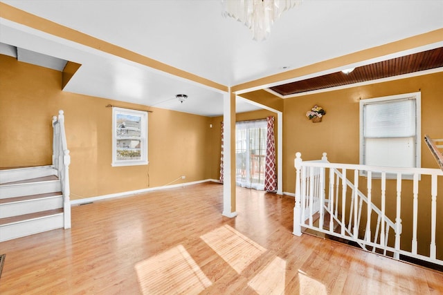 empty room with hardwood / wood-style floors