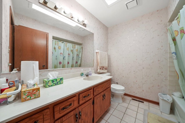 bathroom with tile patterned floors, vanity, a shower with shower curtain, and toilet