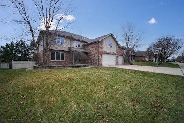 front of property featuring a garage and a front yard