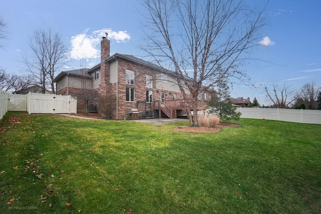 view of yard featuring a deck