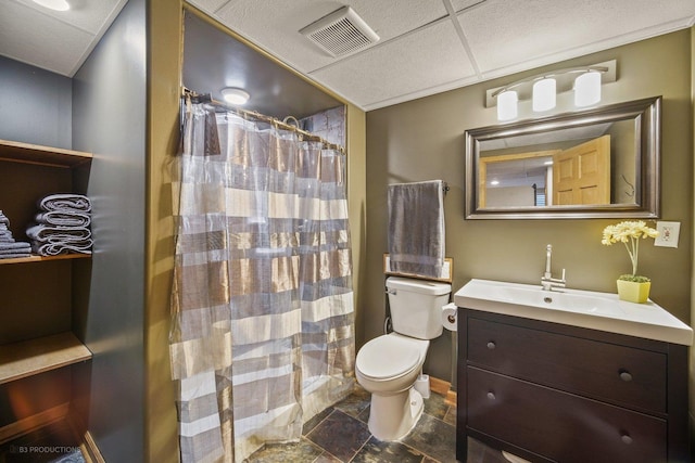 bathroom featuring vanity, toilet, a paneled ceiling, and a shower with curtain