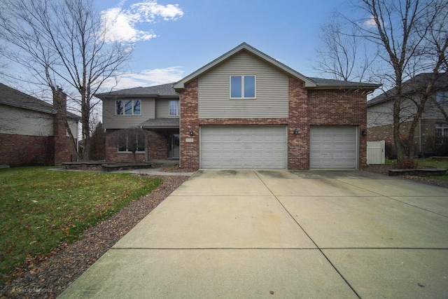 front facade with a front yard and a garage