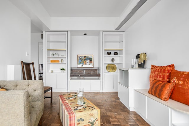 living room with dark parquet flooring