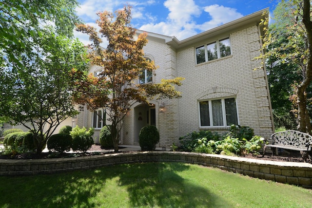 view of front of home with a front yard