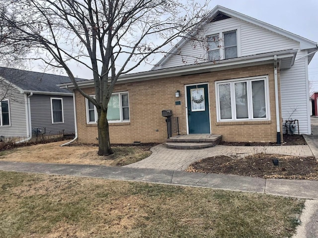 view of front of home with a front yard