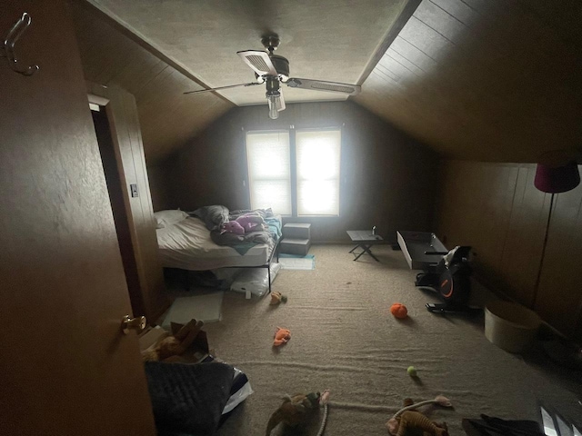 bonus room featuring carpet flooring, vaulted ceiling, and ceiling fan