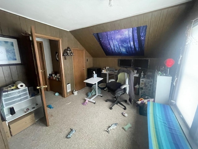 carpeted office with vaulted ceiling and wooden walls