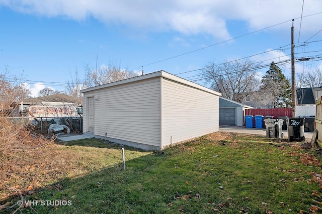 exterior space featuring a yard and a garage