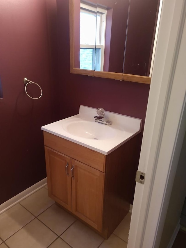 bathroom with tile patterned flooring and vanity